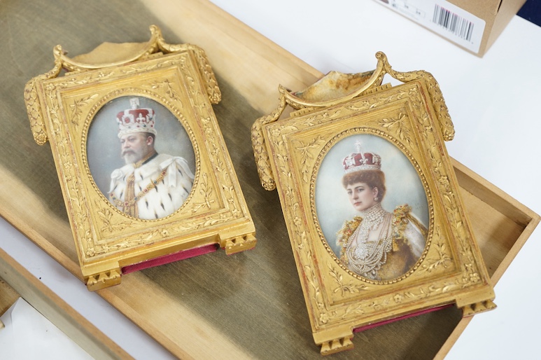 An archive including a pair of miniature portraits on ivory of Edward VII and Queen Alexandra in their coronation robes, in decorative gilt frames with Damask silk backing, 9cm high